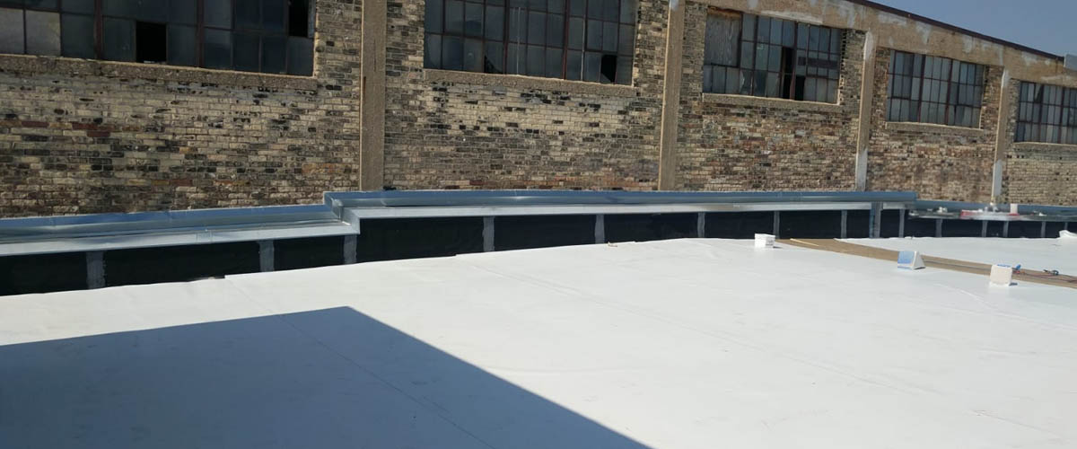 Wisconsin Paperboard TPO roofing install 