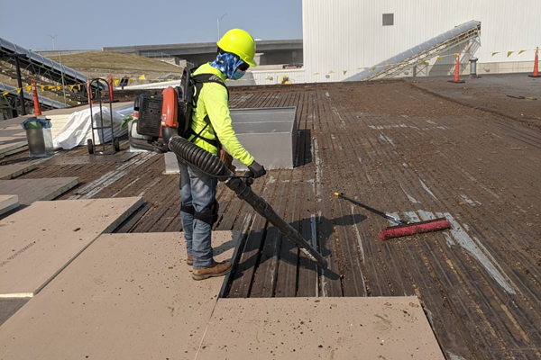 Final view of completed TPO roofing at Ozinga location