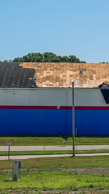 emergency commercial roof repair for wind damage in clifton
