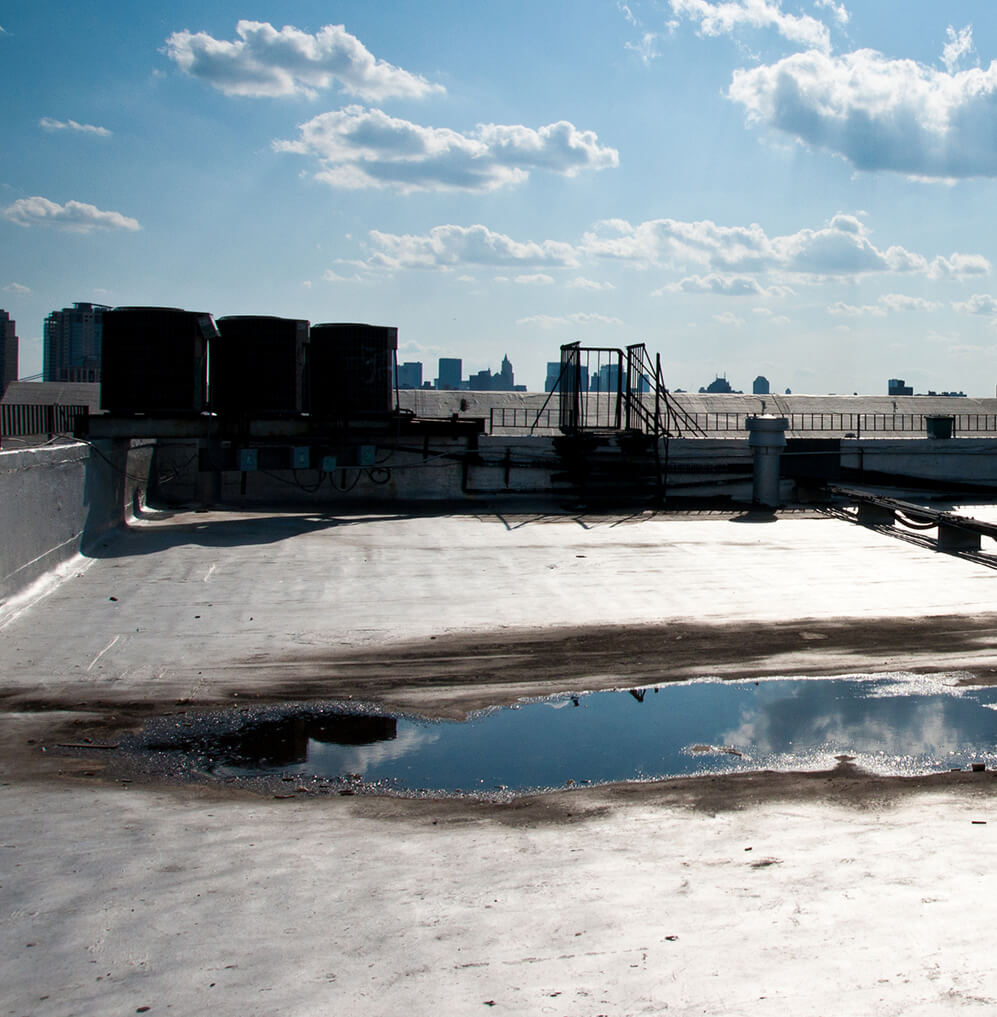 Commercial Flat Roof Inspections for Leaks and Cracks | Roofed Right ...